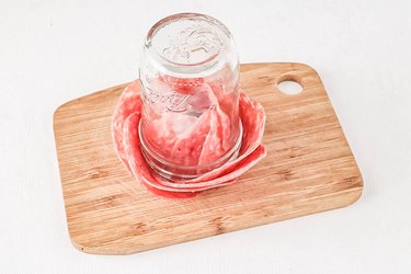 Turn over the jar on a cutting board