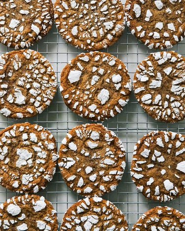 A Cozy Kitchen Gingerbread Crinkle Cookies on a wire rack