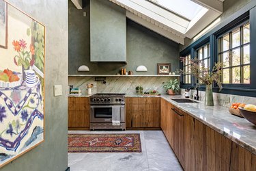 walnut kitchen with industrial windows