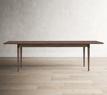 Image of an acacia wood Scandinavian extendable dining table