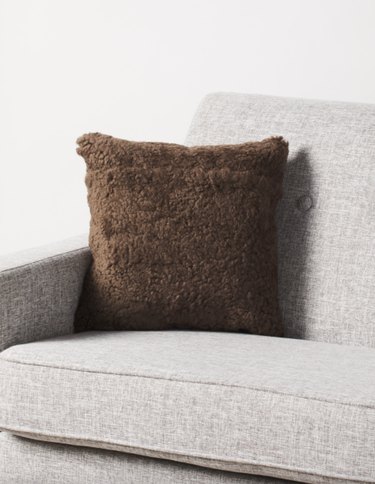 brown sheepskin pillow