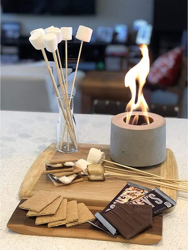 fire pit with smores ingredients
