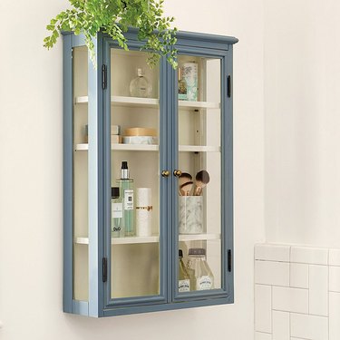blue toiletry cabinet