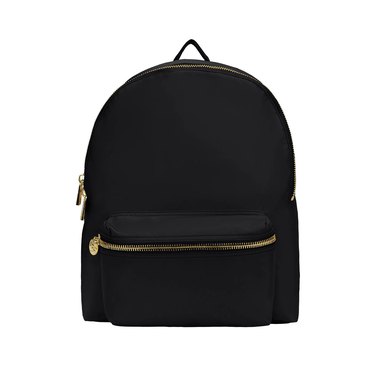 black simple backpack with gold accents