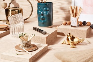 Porcelain matches container, glasses, pen knife, vase with face, diffuser sticks, gold rooster ornament
