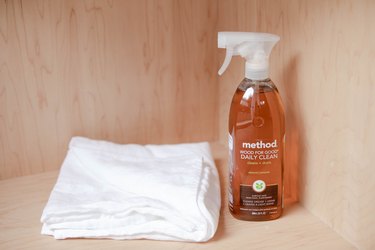 method cleaner spray with white towel