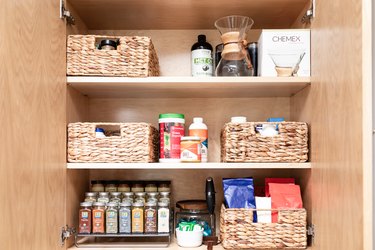 Pantry with spices and rattan boxes