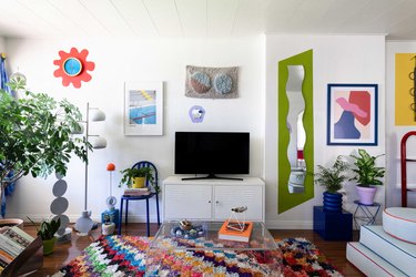 Living room with bold, colorful, and eclectic decor with wavy shapes.