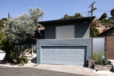 Light gray garage door colors on darker gray home.