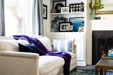 navy blue, tan, and purple living room