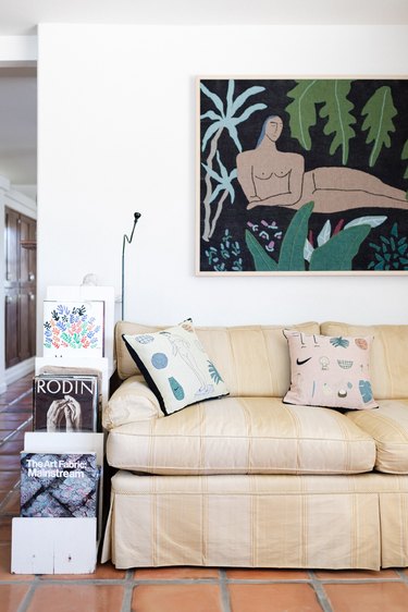 couch with blanket with figure