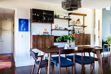 table with royal blue chairs