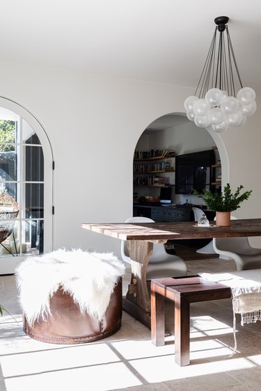 A Mediterranean styled dining room with brown-white accents