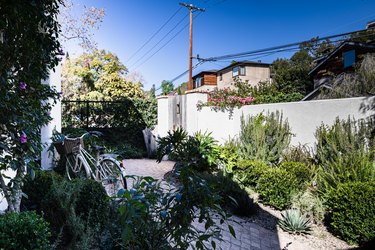 A mediterranean home with a garden