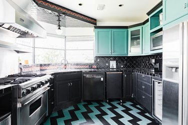 Black Room Ideas with  bold kitchen with turquoise-black flooring and cabinets