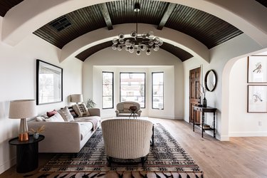 room with high ceiling painted brown