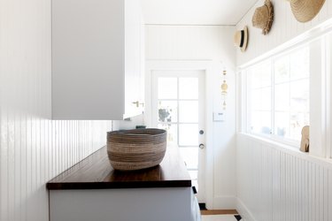 Woven basket on laundry room countertop