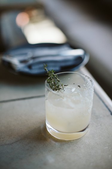 Cocktail with green sprig