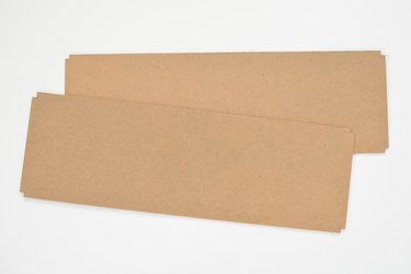 Two rectangular cardboard panels against a white background