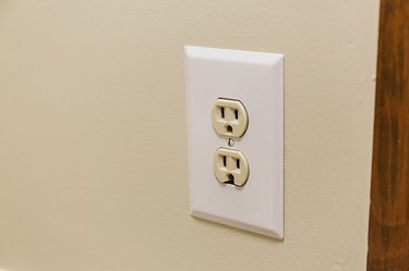 A double electrical outlet on a wall