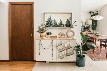 IKEA Bestå sideboard with Scandinavian holiday decor and stockings