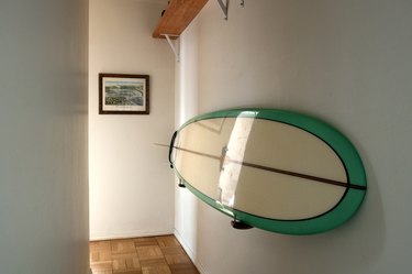 Surf board hung on a wall