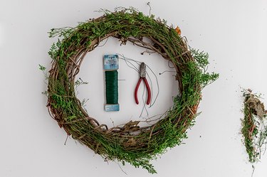 Faux Evergreen Christmas Wreath with wire cutters and green wire