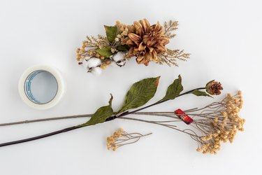 Faux yellow and brown flowers with heavy duty transparent tape