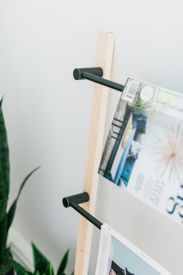 Wood and metal ladder with magazines