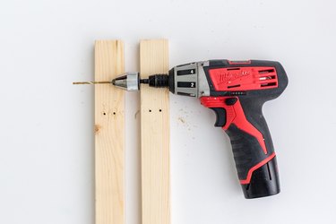 Power drill with wood boards
