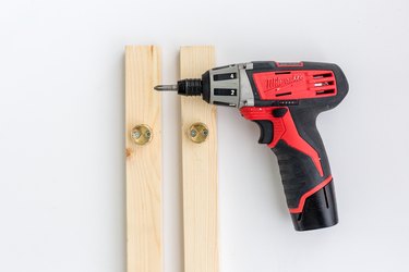 Power drill with wood boards