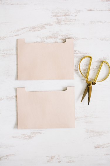 scissors and leather squares  cut for turning into pockets