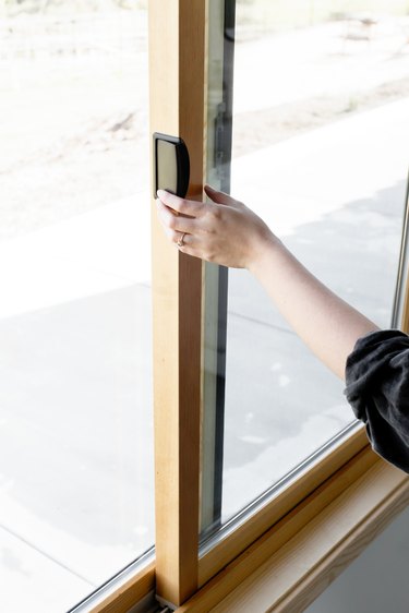 Hand opening sliding window