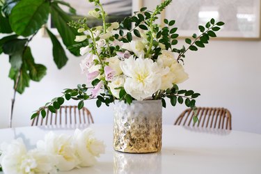 Textured vase with white and pink flowers