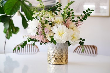 Textured vase with pink and white flowers