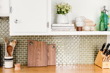 kitchen backsplash mosaic tile and white cabinets