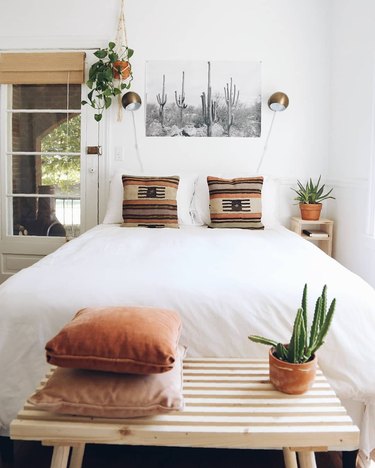 White-dominant minimal bedroom with southwestern accents