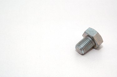 What is the difference between metric and standard fasteners?