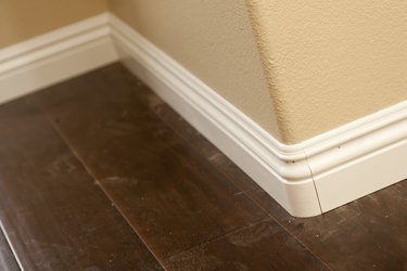 New Baseboard, Bull Nose Corners with Newly Installed Laminate Flooring