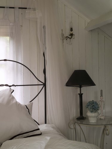 Wrought iron bed and bedside table
