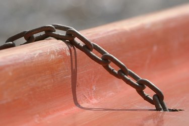 Chain attached to plastic surface