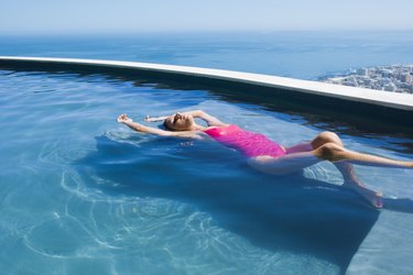 Woman lying in a pool