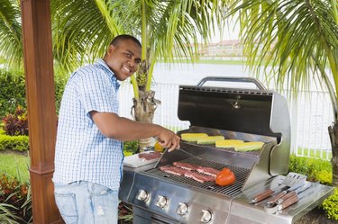 African man barbecuing