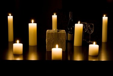 Group of lit candles on a table