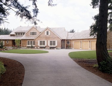 A smooth concrete driveway adds beauty and functionality to a home