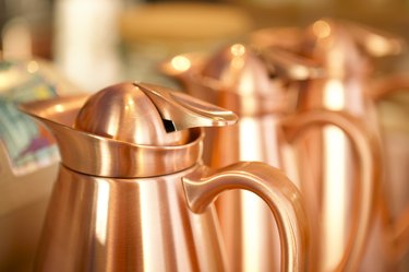 Row of copper coffeepots