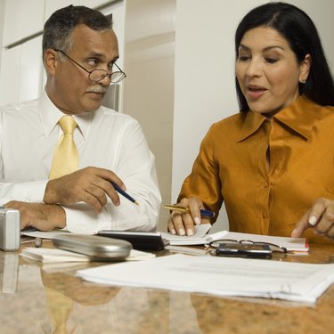 Mature couple working at home