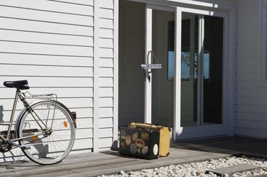 Bicycle and luggage at beach house