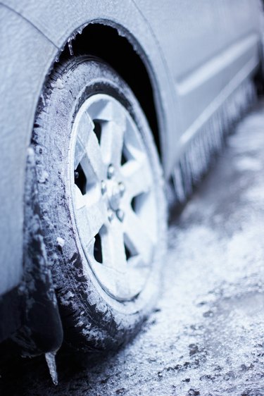 Icicles on fender of car