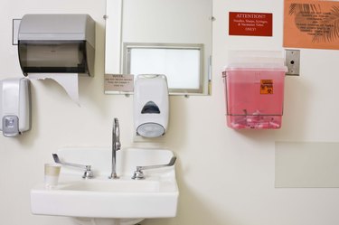 How to open soap on sale dispenser on wall